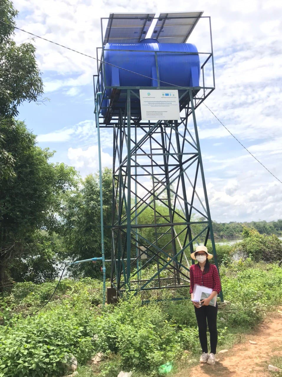 Mariny from the EWB Australia team in Cambodia with the solar-powered water supply system